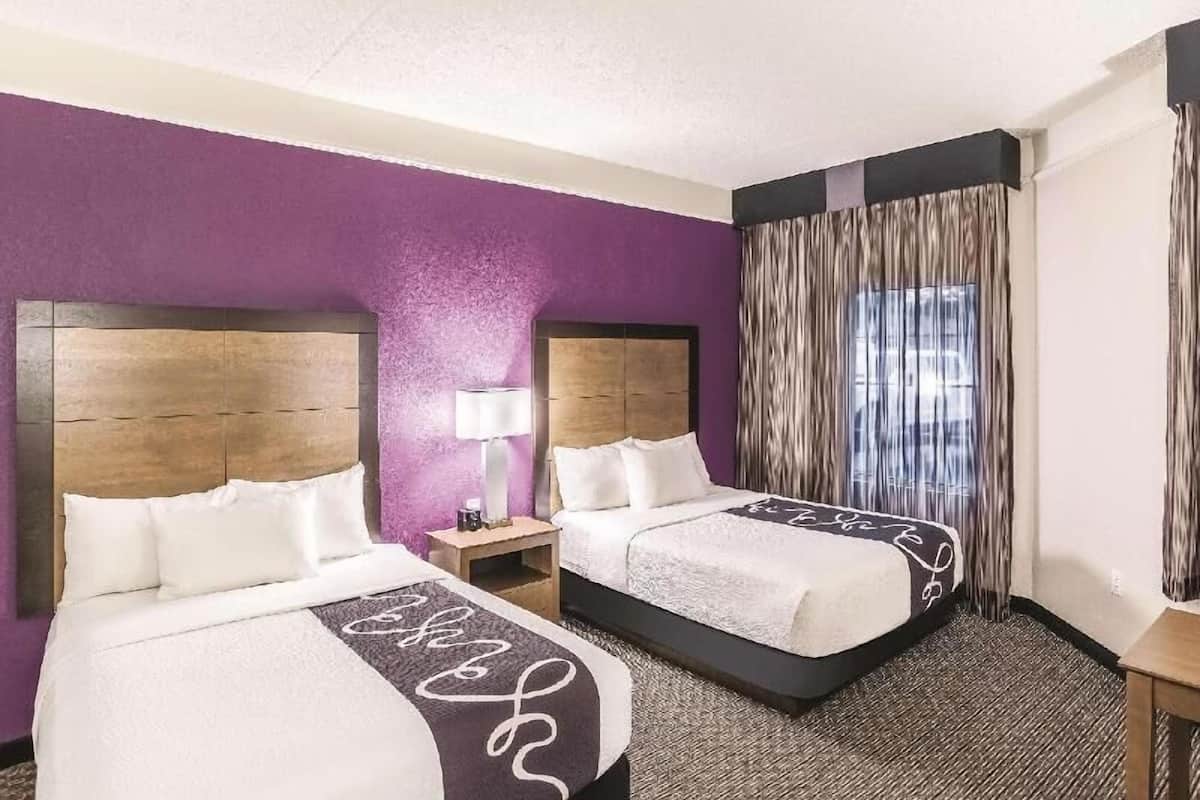 Premium bedding, pillow-top beds, desk, blackout curtains