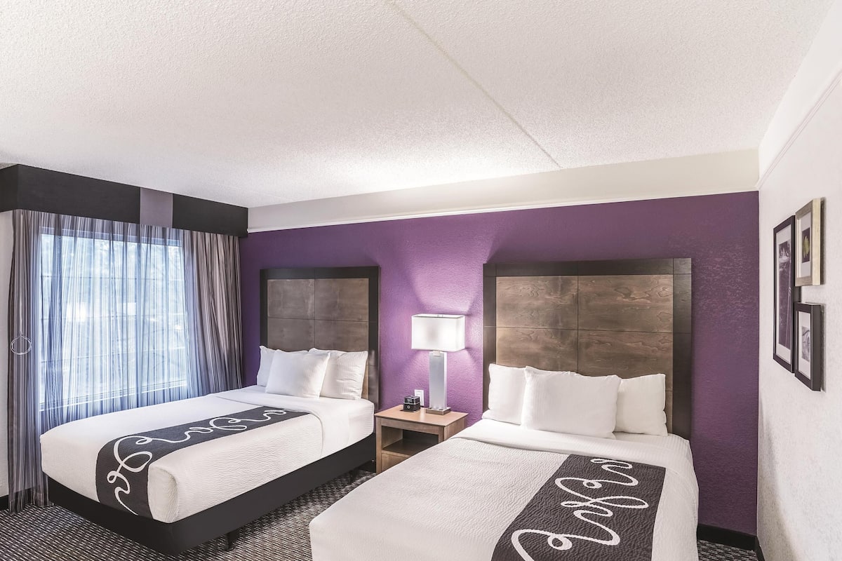 Premium bedding, pillowtop beds, desk, blackout drapes