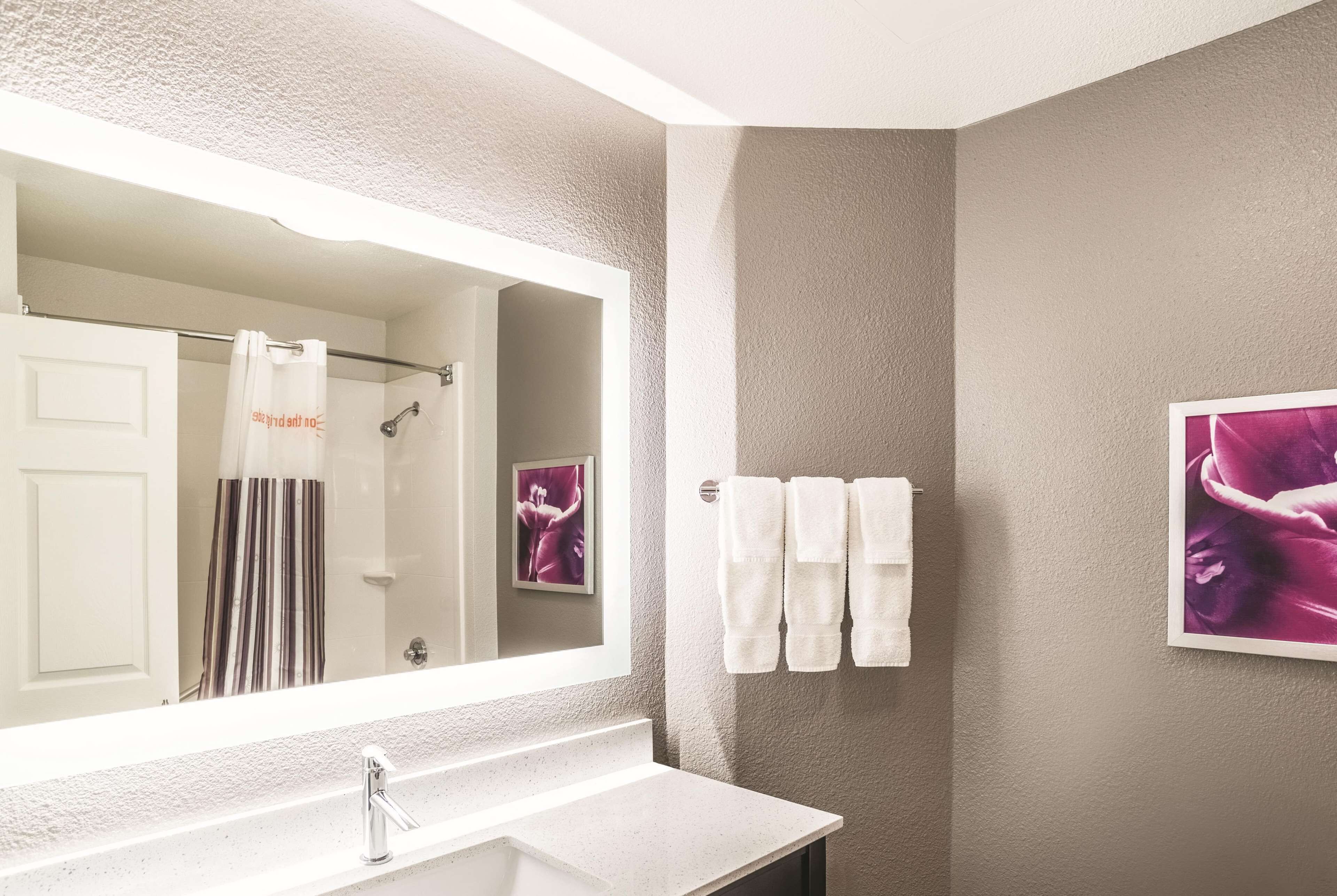 premium bedding, pillow-top beds, desk, blackout curtains