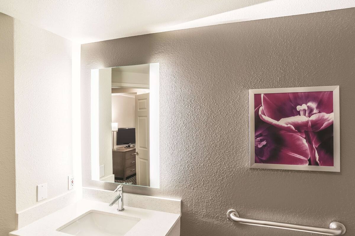 premium bedding, pillow-top beds, desk, blackout curtains