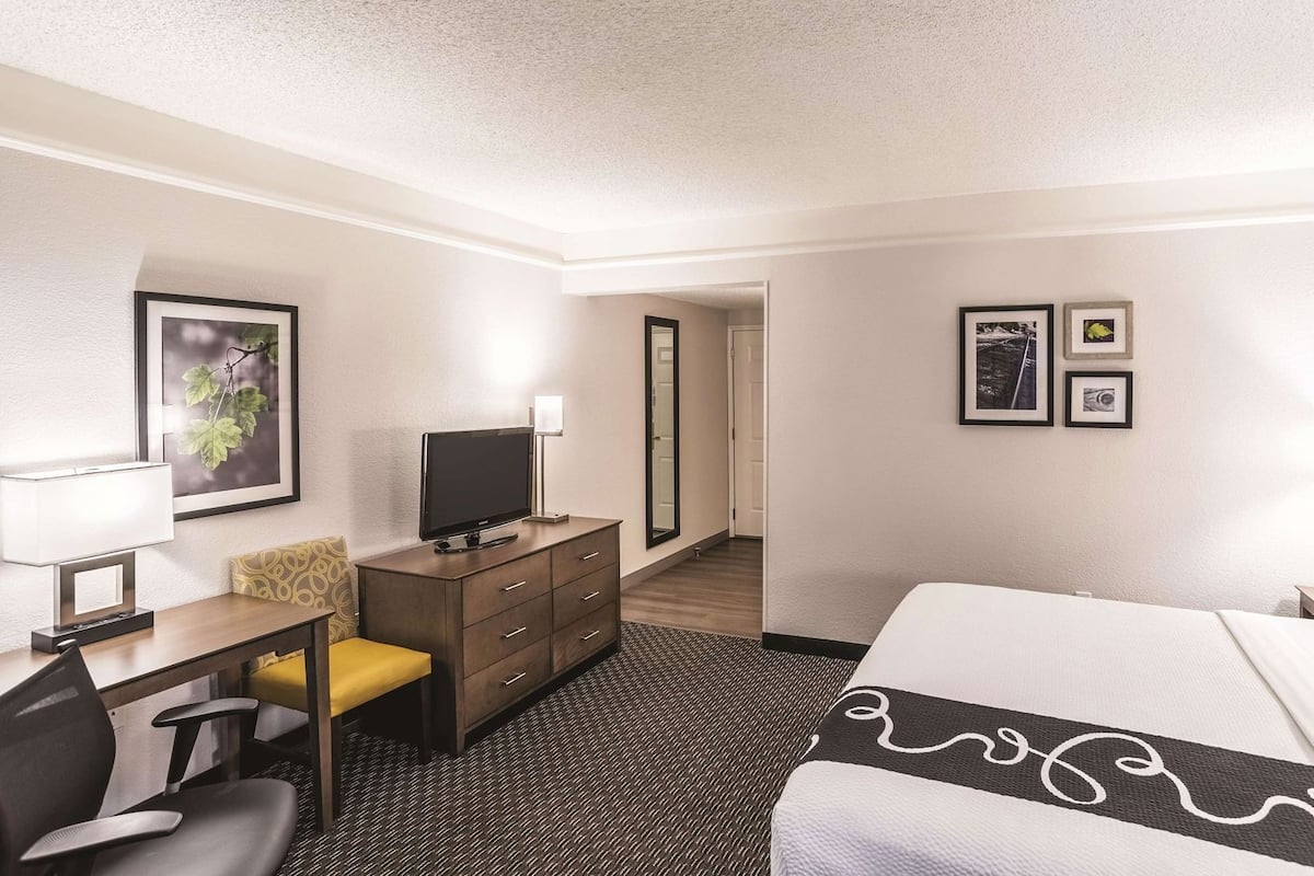 Premium bedding, pillow-top beds, desk, blackout curtains