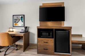 Hypo-allergenic bedding, desk, laptop workspace, blackout curtains