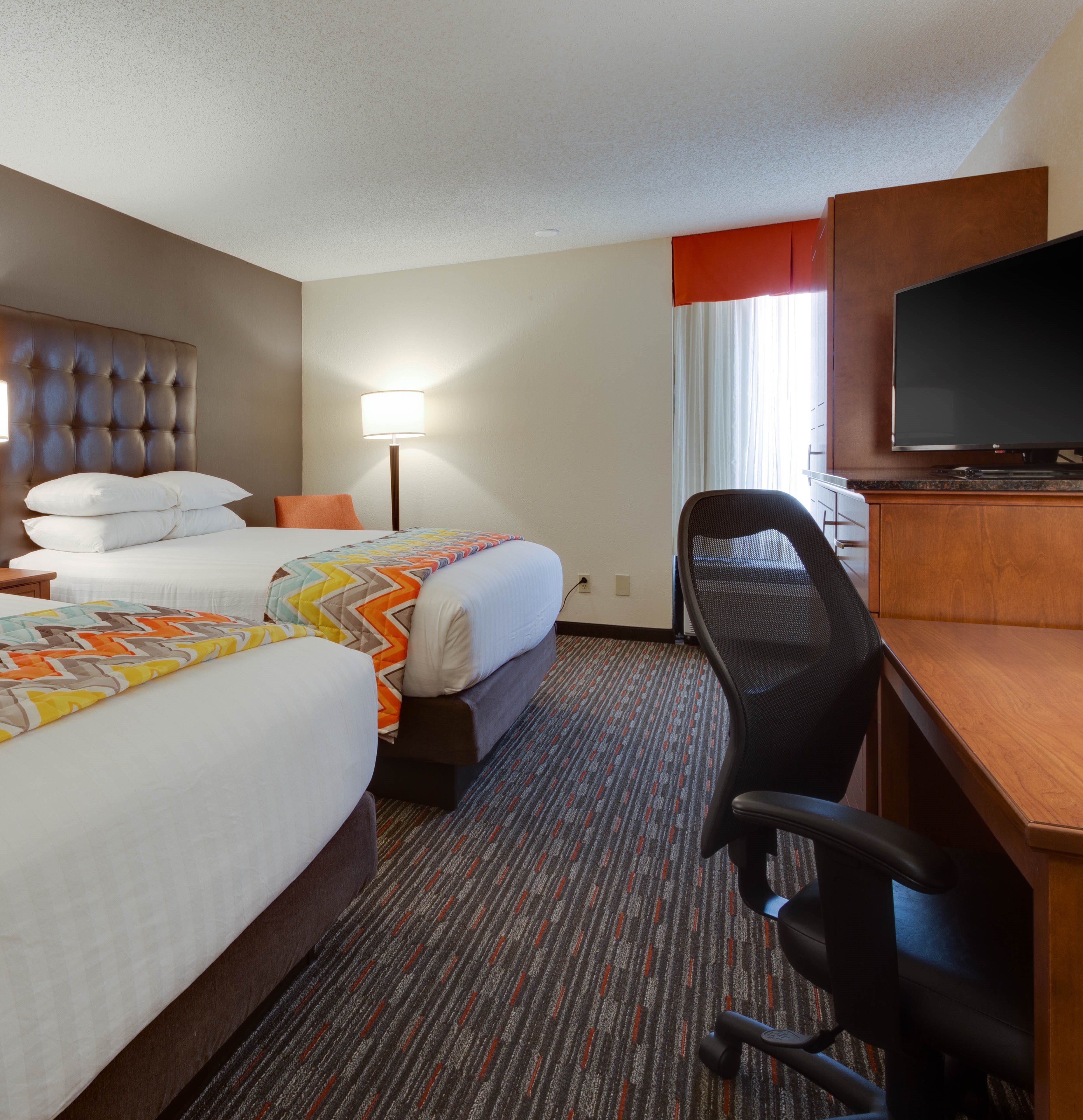 desk, blackout curtains, iron/ironing board, free cots/infant beds