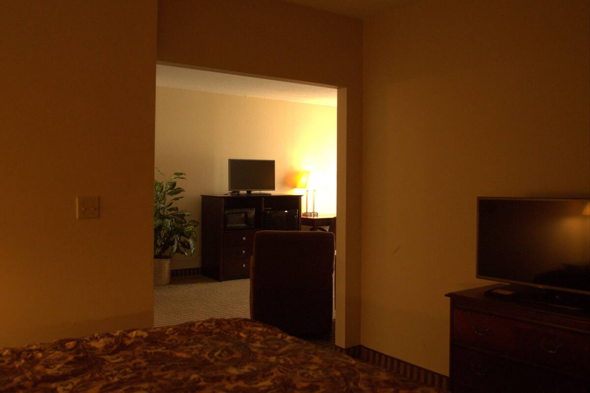 desk, blackout curtains, iron/ironing board, free cots/infant beds