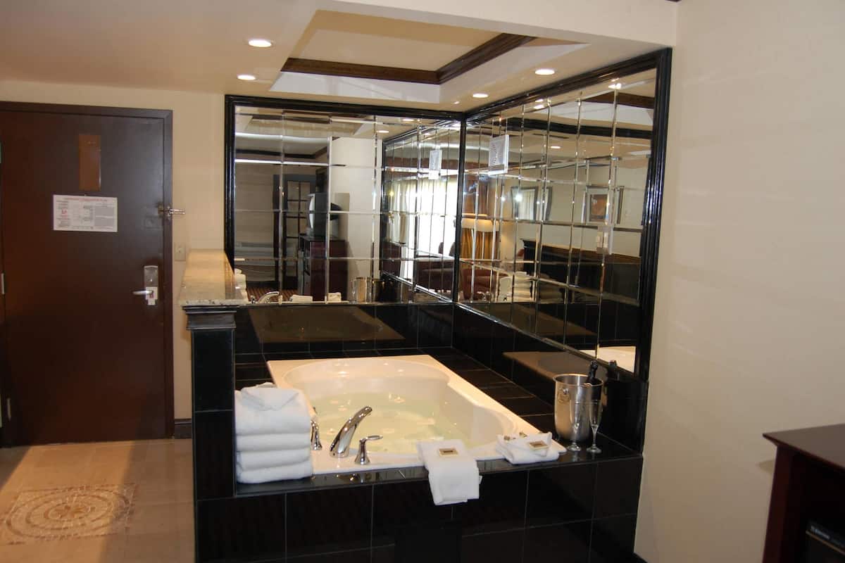 desk, blackout curtains, iron/ironing board, free cots/infant beds