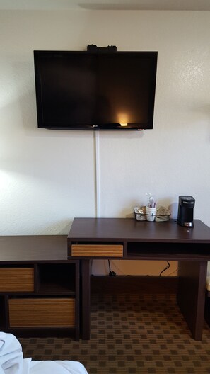 Desk, blackout drapes, iron/ironing board, free cribs/infant beds