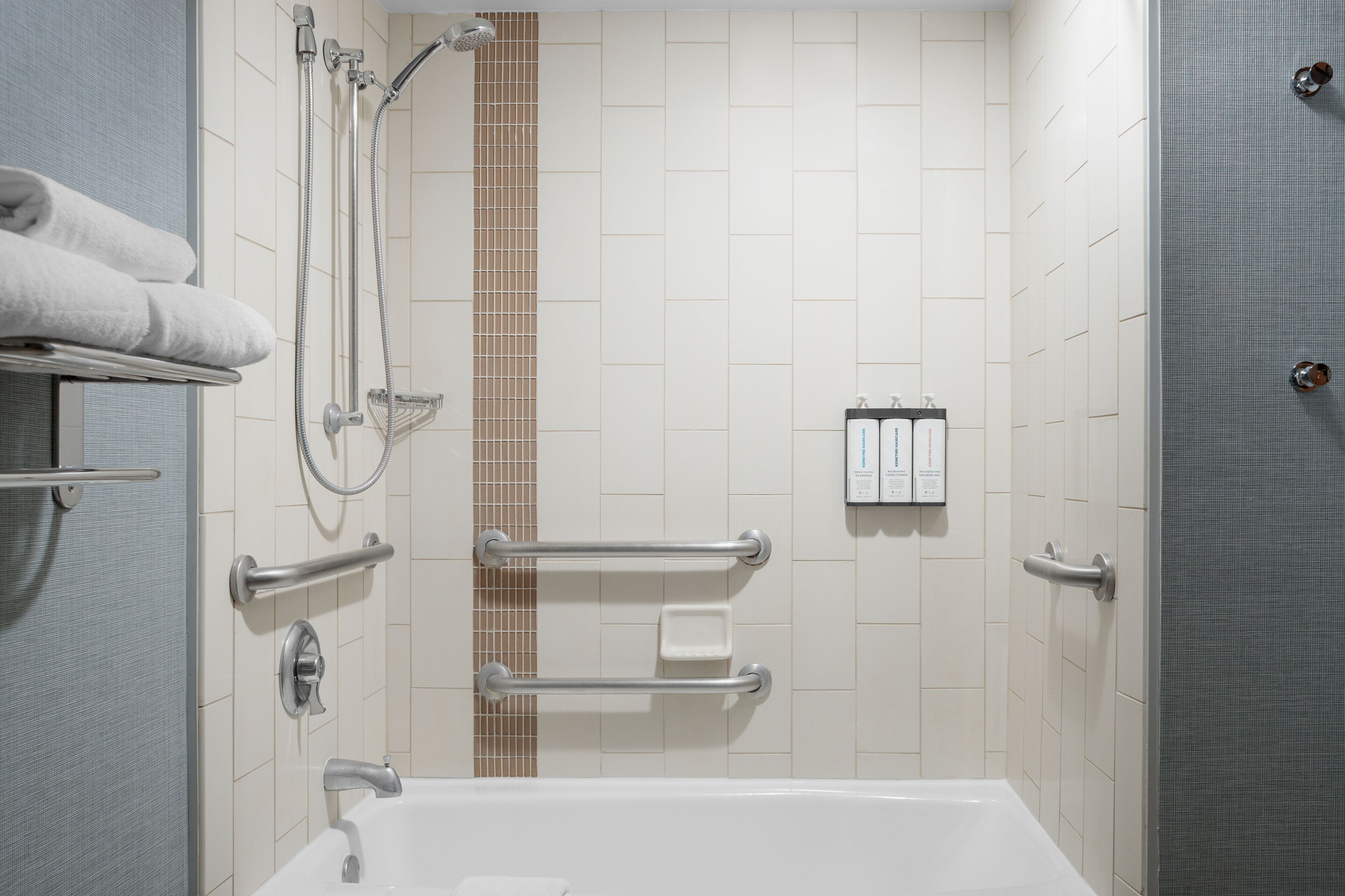 accessible suite, 2 queen beds & sofa bed (accessible bathtub) | bathroom | combined shower/bathtub, hydromassage showerhead, designer toiletries