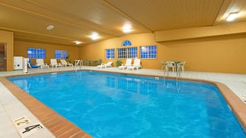 Indoor pool, open 8:00 AM to 10:00 PM, pool loungers