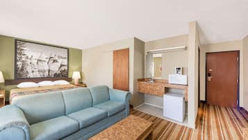 Suite, 1 King Bed | Desk, iron/ironing board, free cribs/infant beds, rollaway beds