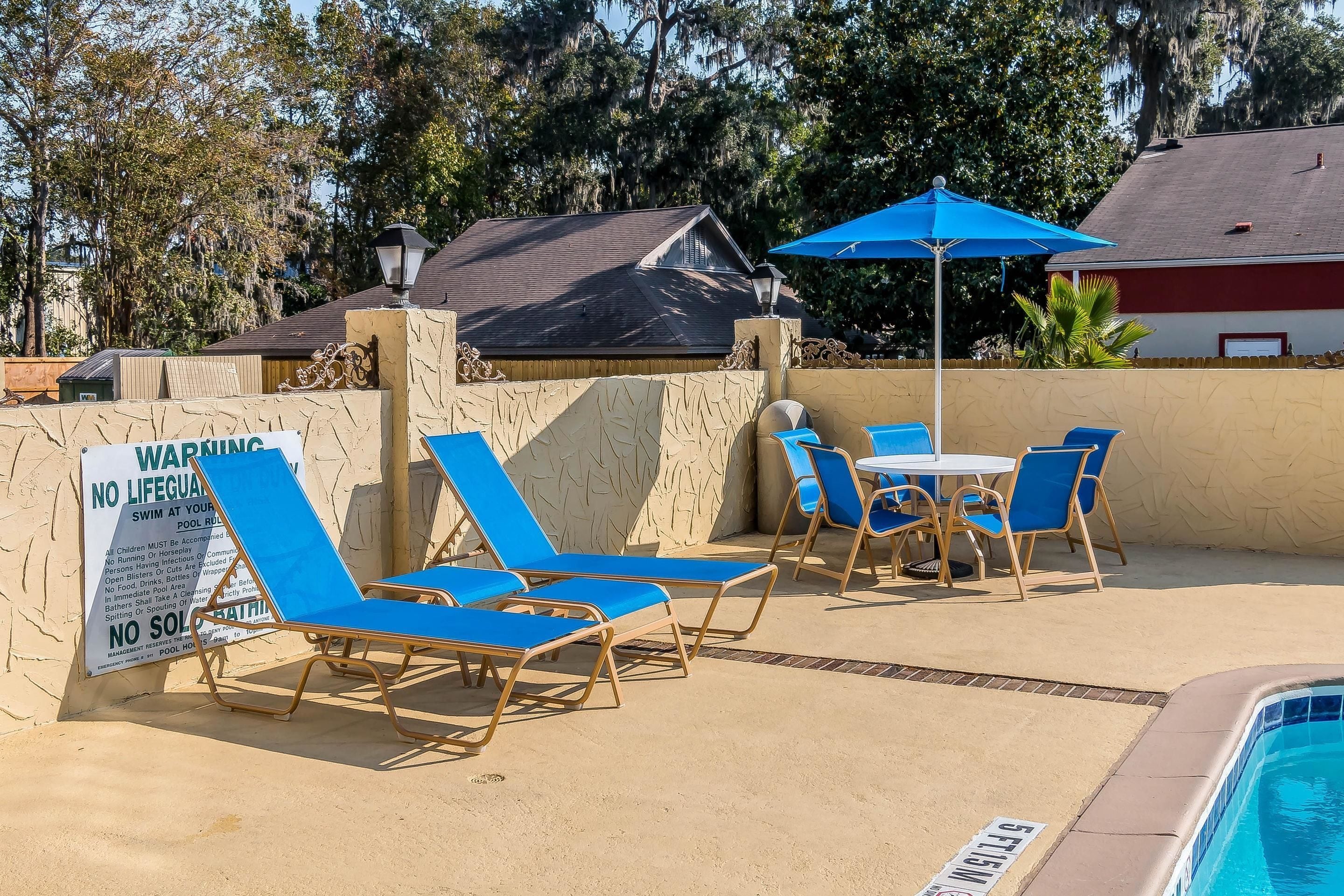 seasonal outdoor pool, pool umbrellas, pool loungers