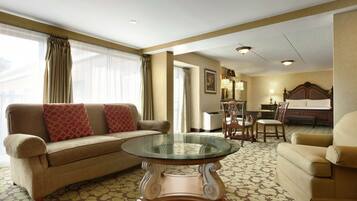 Suite, 1 King Bed, Jetted Tub (Manhattan Suite) | Living area | 37-inch TV with premium channels