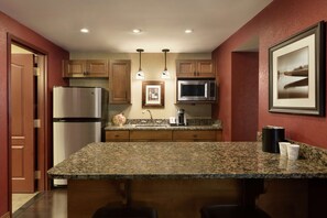 Suite, 1 King Bed, Separate Living Area, Hearing Accessible (Hickory Suite) | Blackout drapes, iron/ironing board, free cribs/infant beds