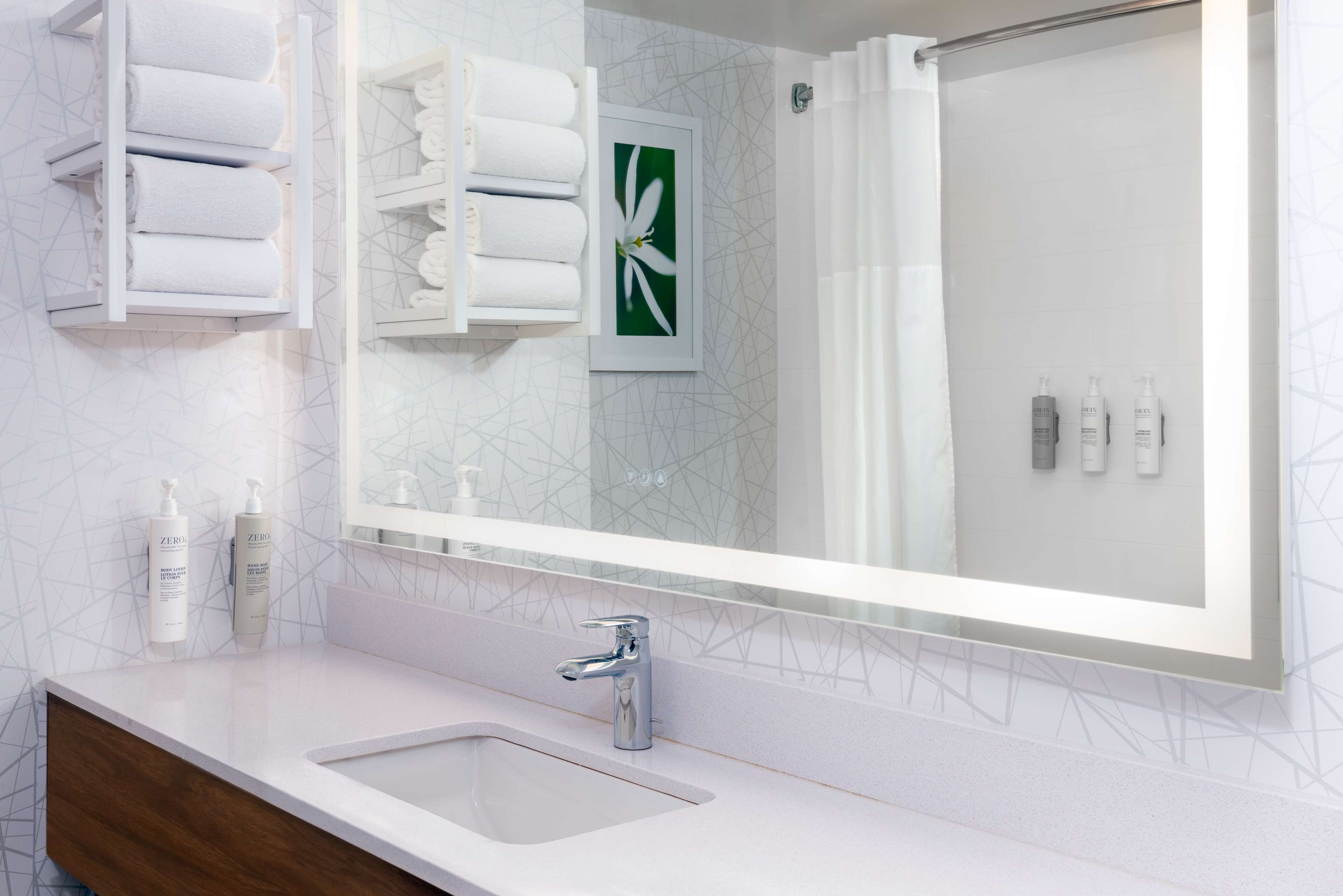 combined shower/bathtub, free toiletries, hair dryer, towels