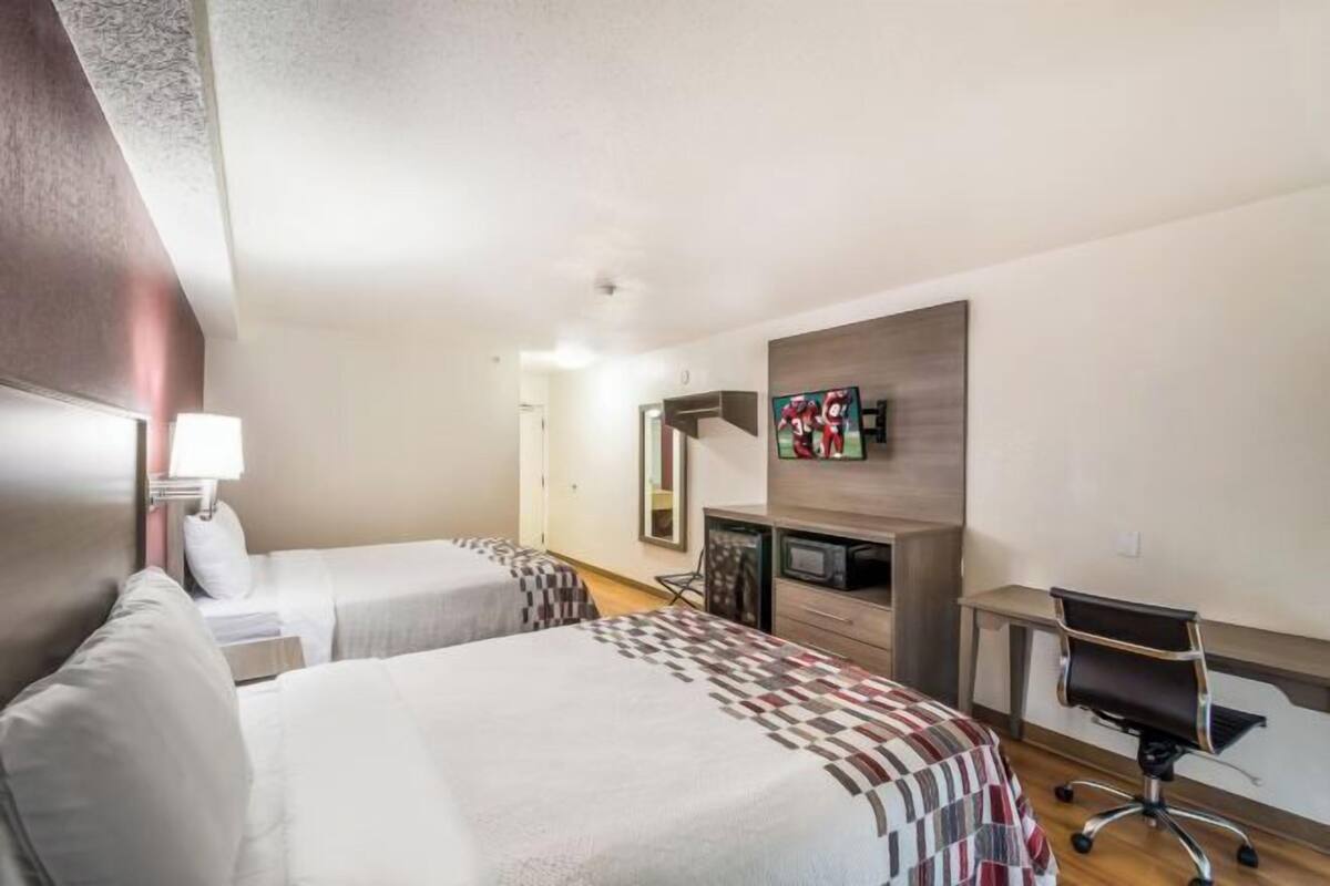 Desk, laptop workspace, blackout curtains, free WiFi