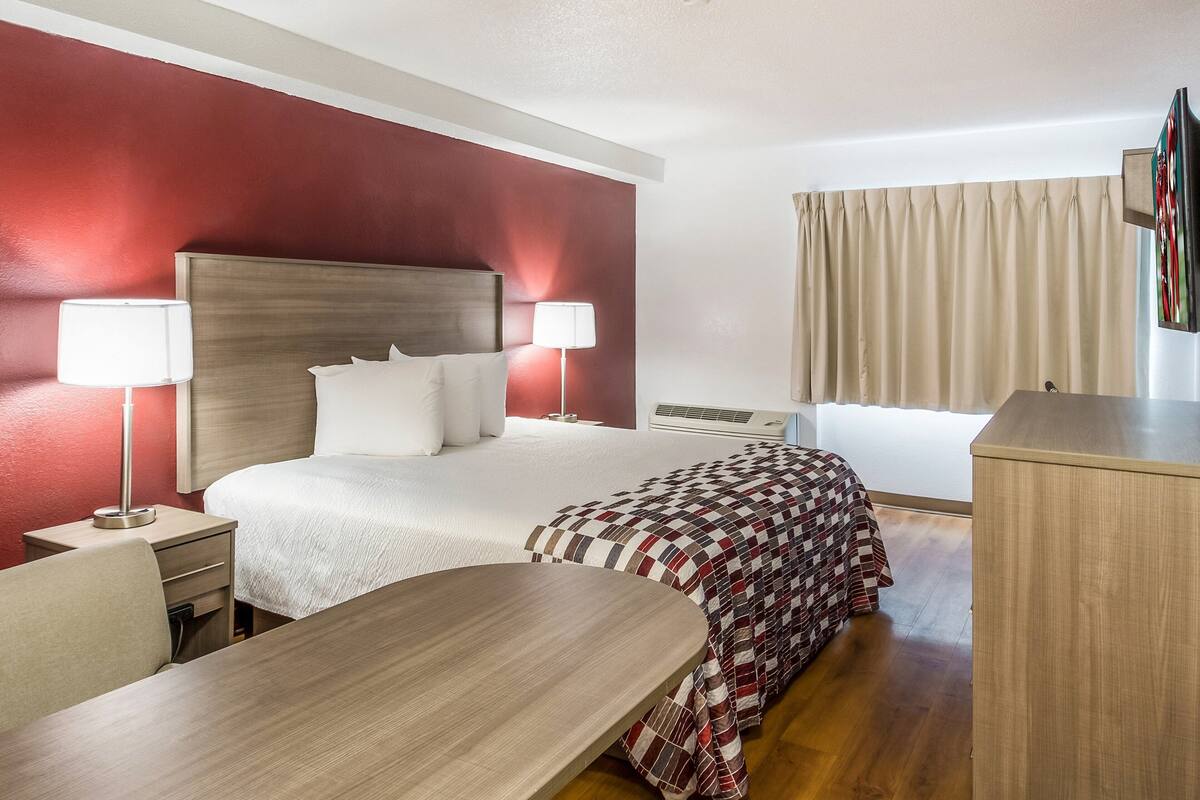 desk, laptop workspace, blackout curtains, free wifi