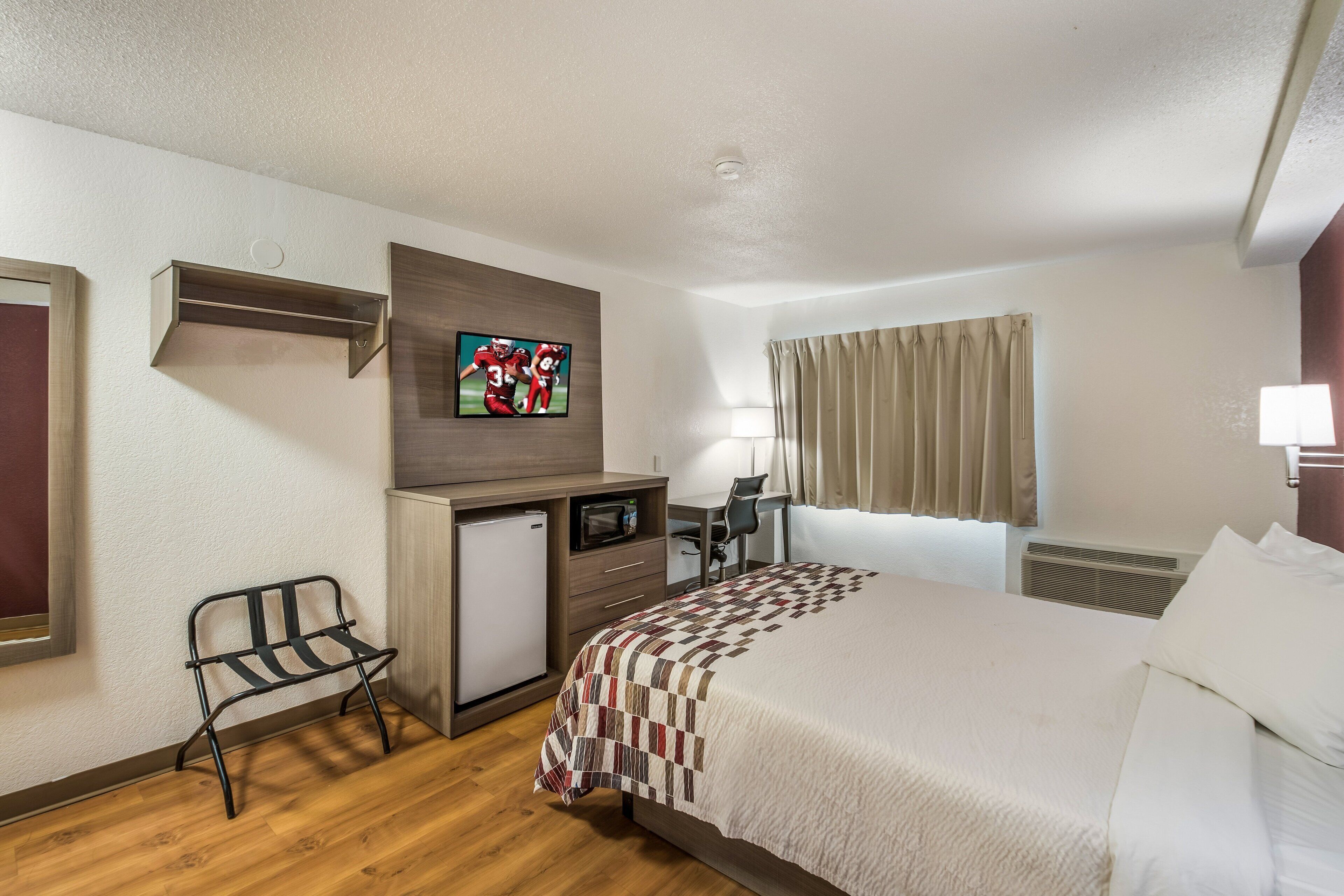 desk, laptop workspace, blackout curtains, free wifi