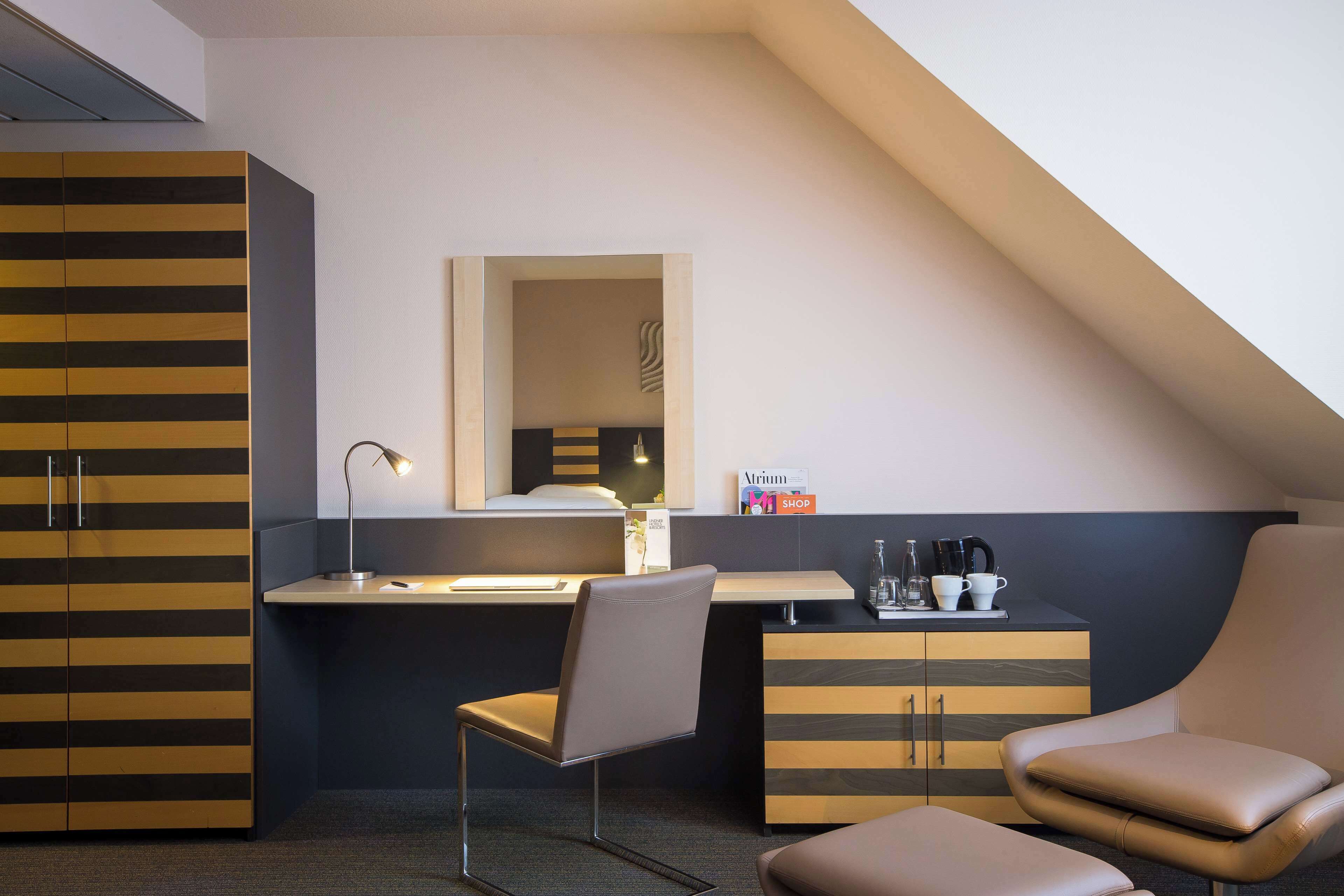 hypo-allergenic bedding, in-room safe, desk, blackout curtains