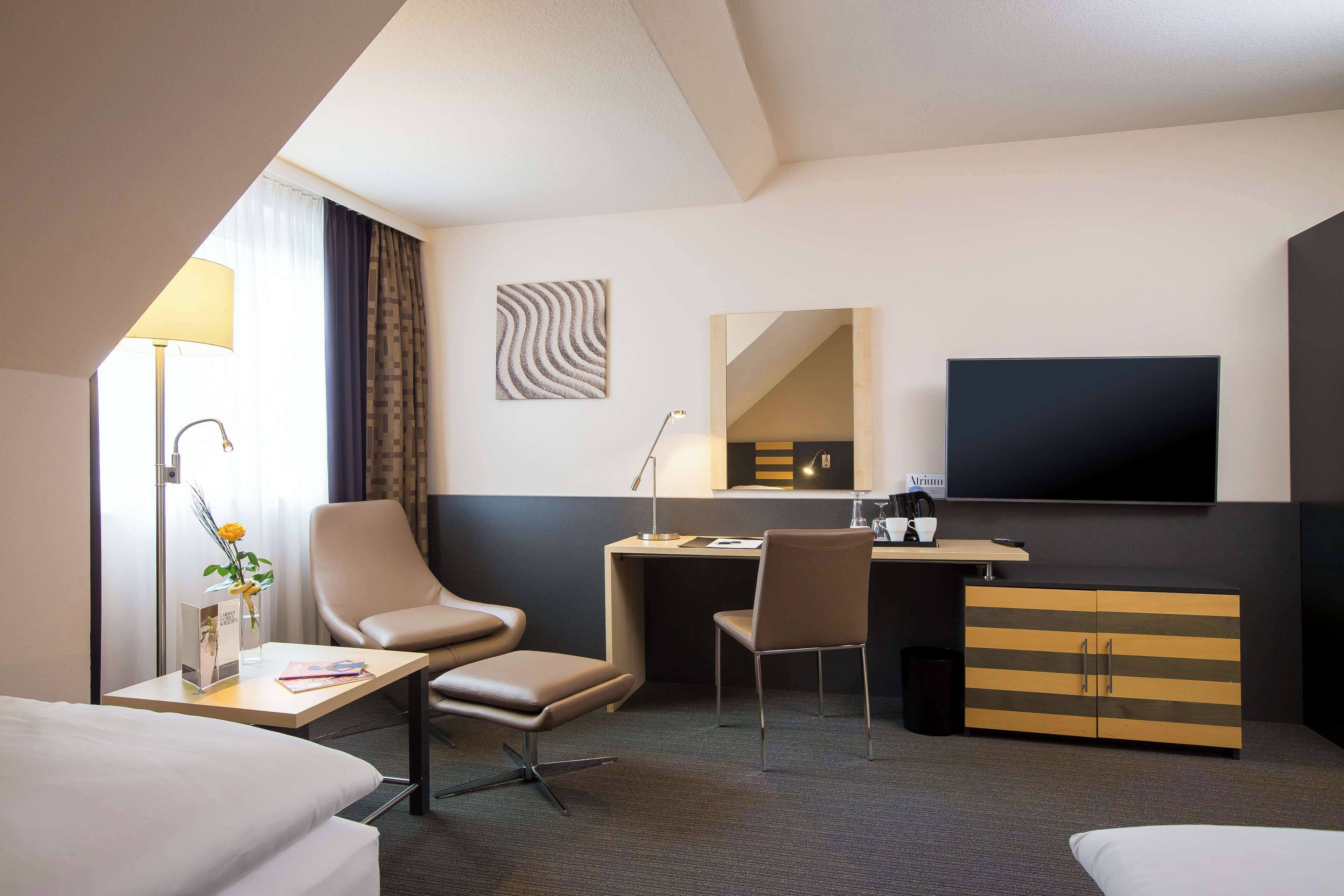 hypo-allergenic bedding, in-room safe, desk, blackout curtains