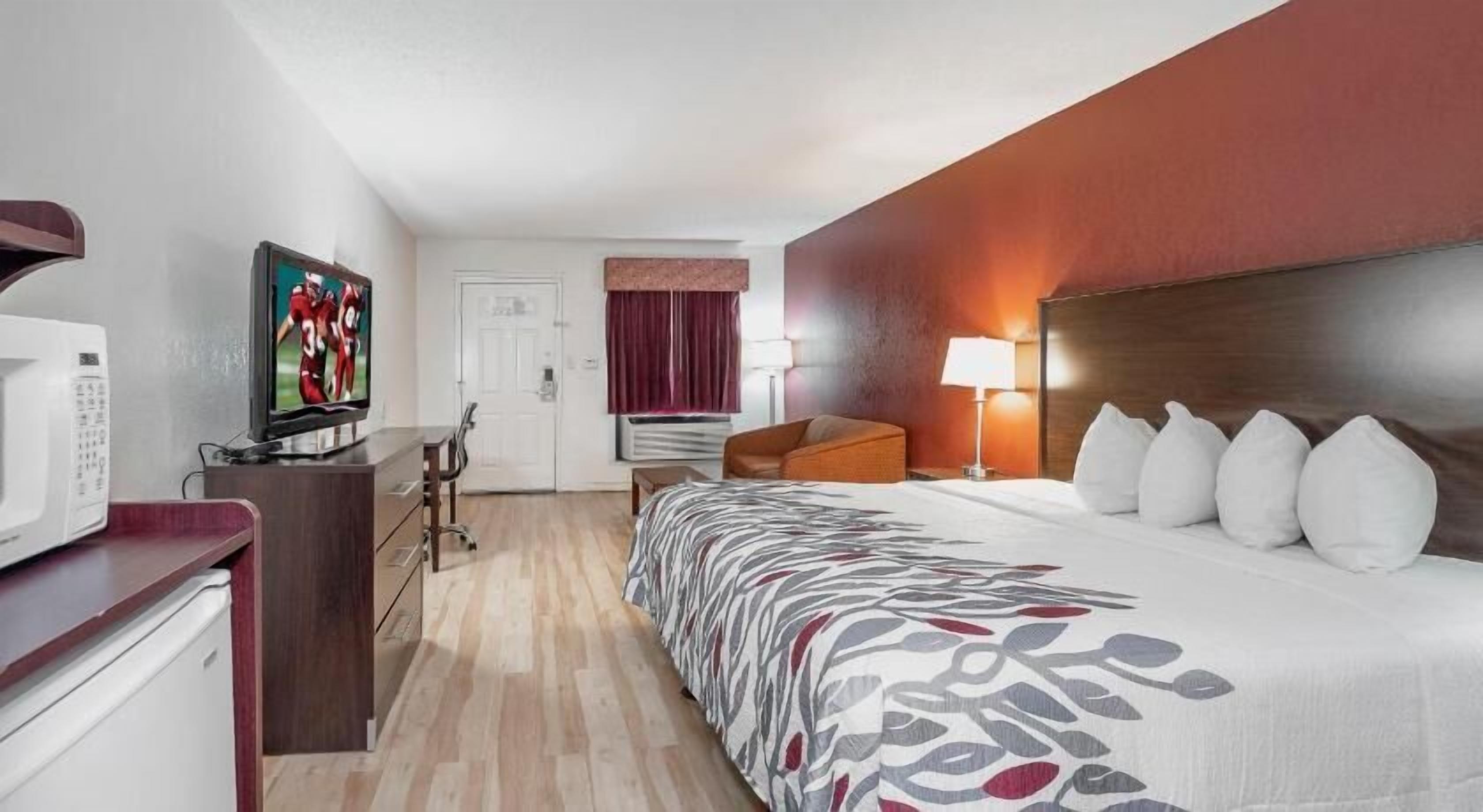 Blackout drapes, iron/ironing board, free cribs/infant beds, free WiFi