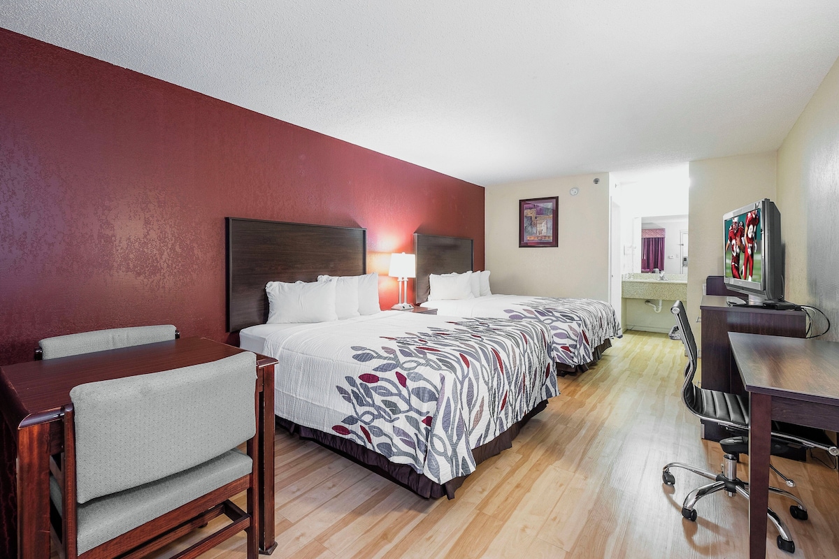 Blackout drapes, iron/ironing board, cribs (free), WiFi (free)