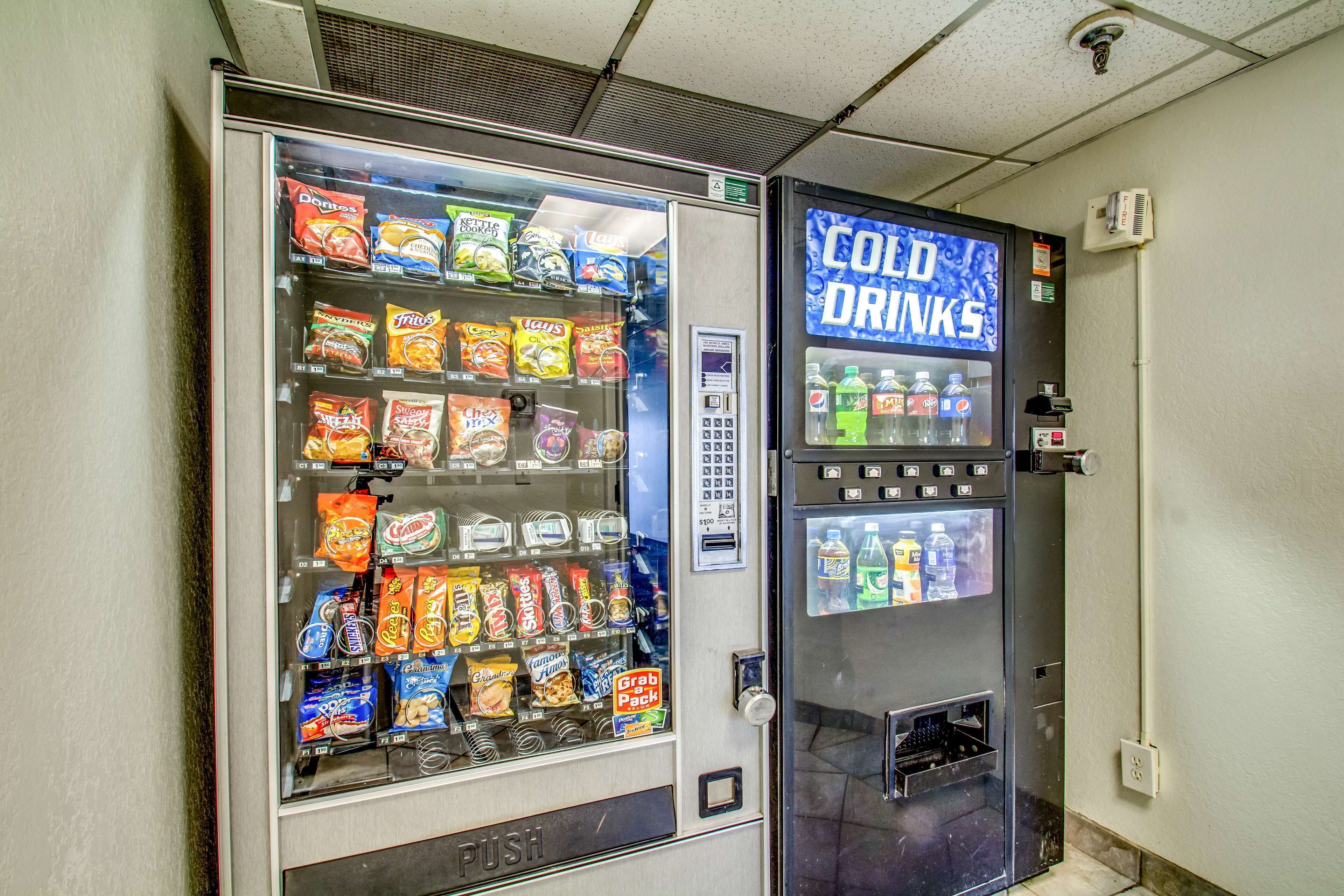 A vending machine with snacks and a cold drinks dispenser.