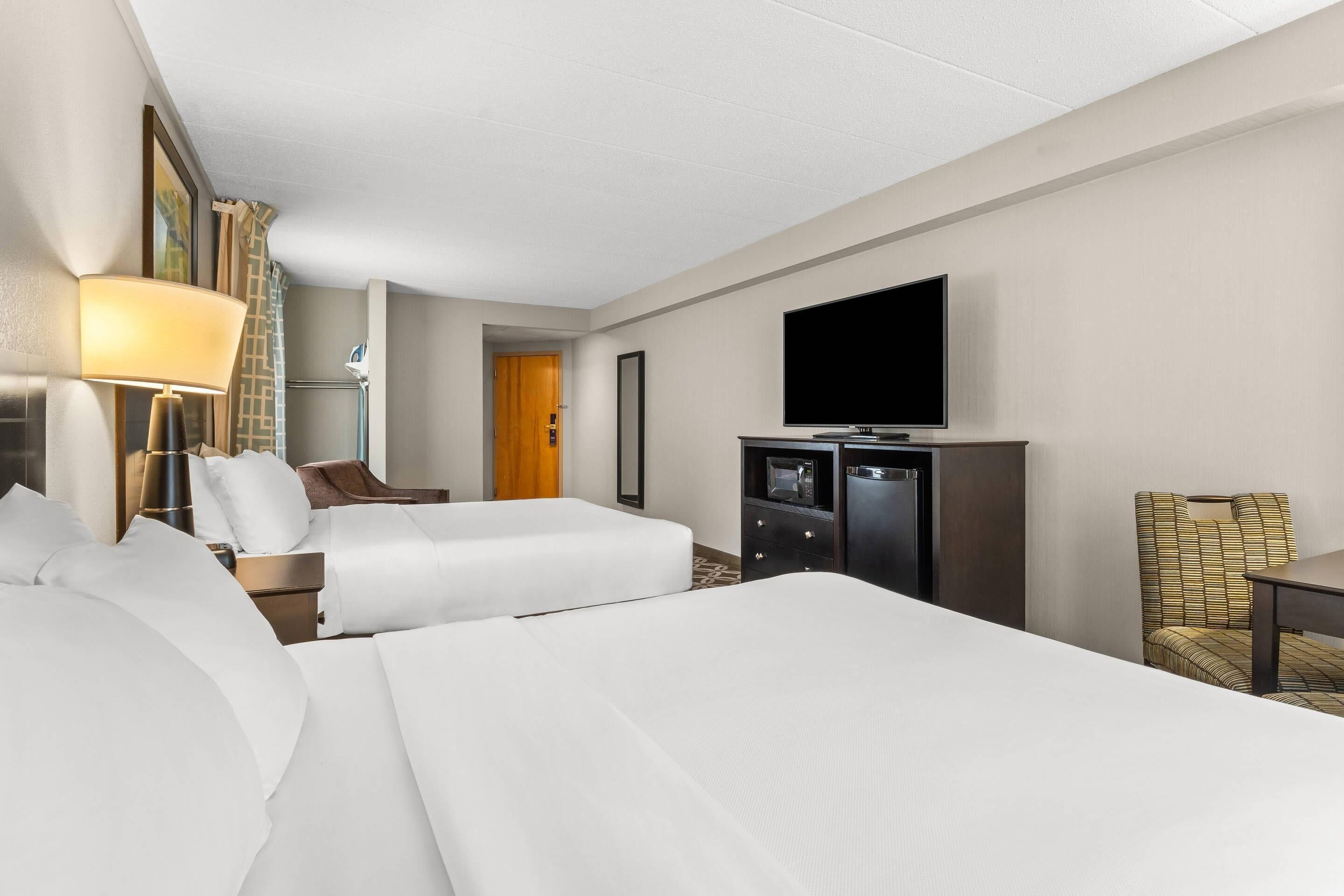 standard room, 2 queen beds, non smoking | premium bedding, in-room safe, desk, blackout curtains