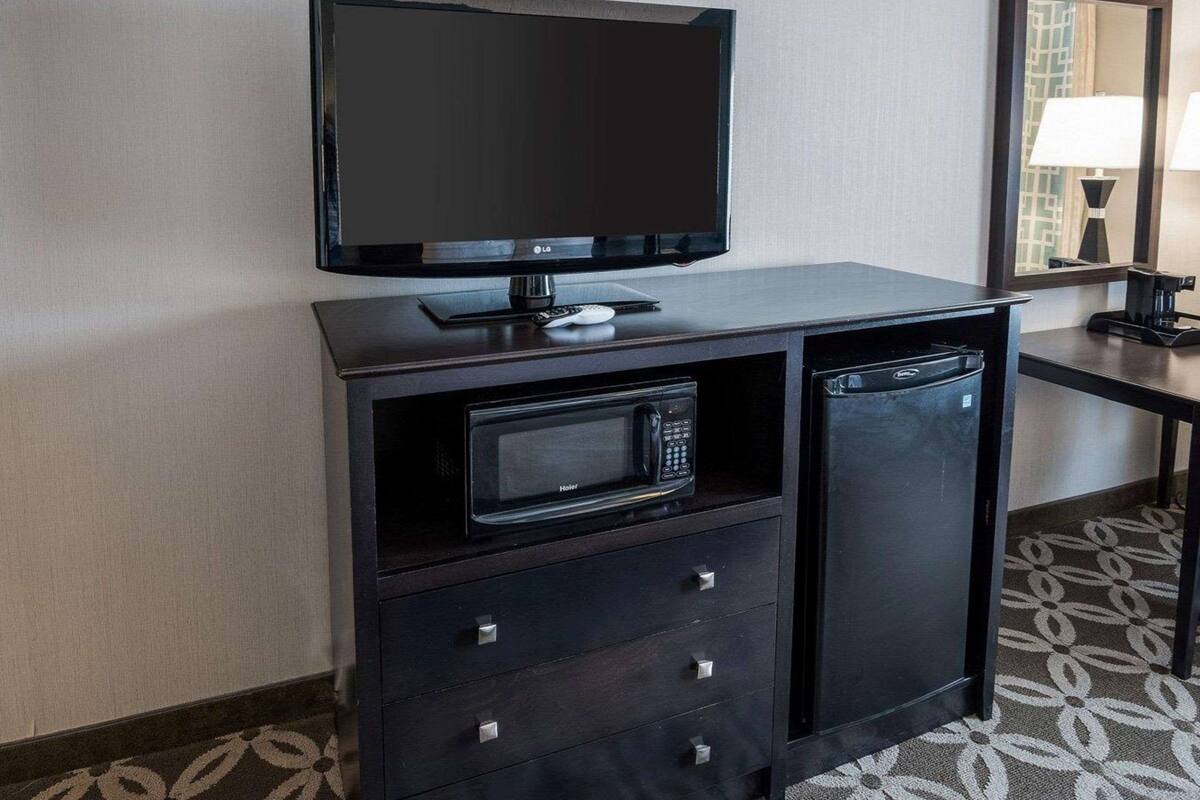 suite, 1 king bed with sofa bed, non smoking | premium bedding, in-room safe, desk, blackout curtains