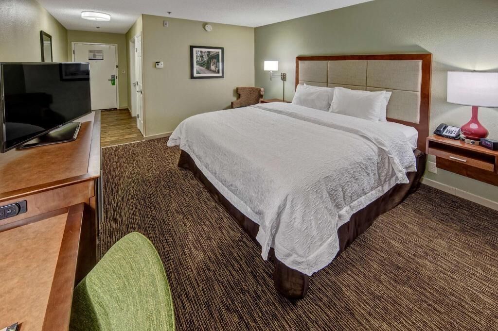 Premium bedding, desk, blackout drapes, iron/ironing board