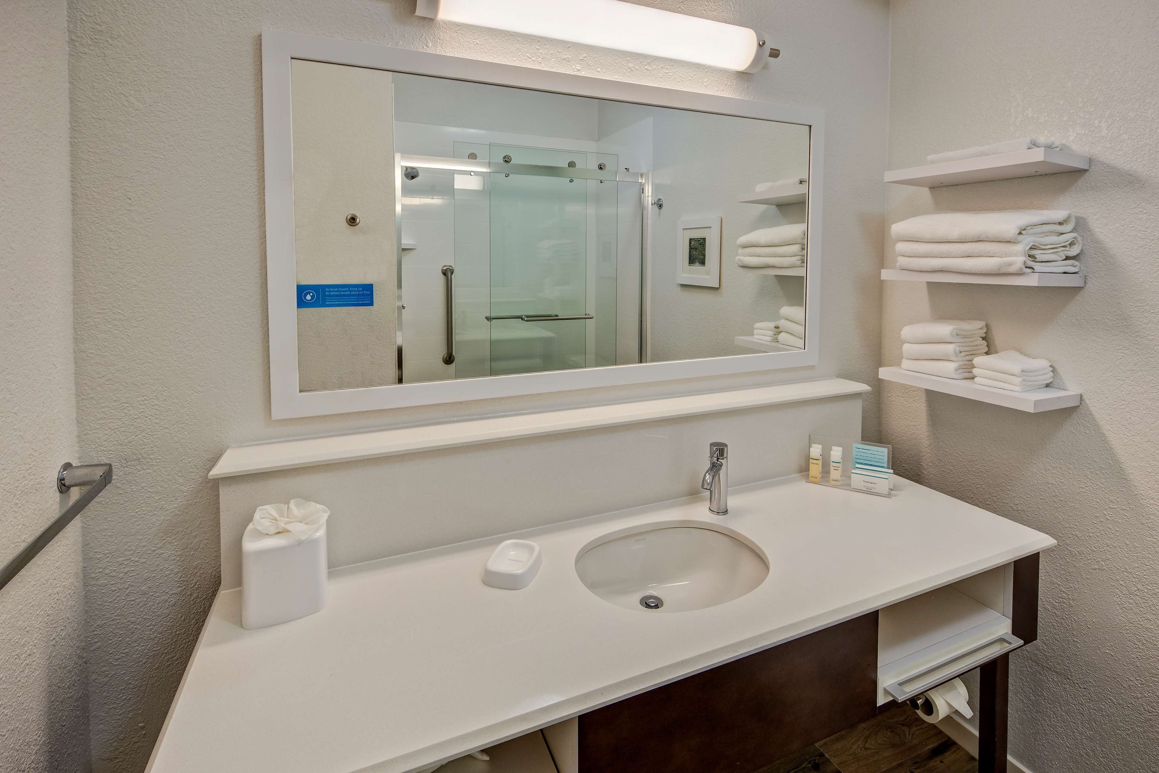 combined shower/bathtub, free toiletries, hair dryer, towels