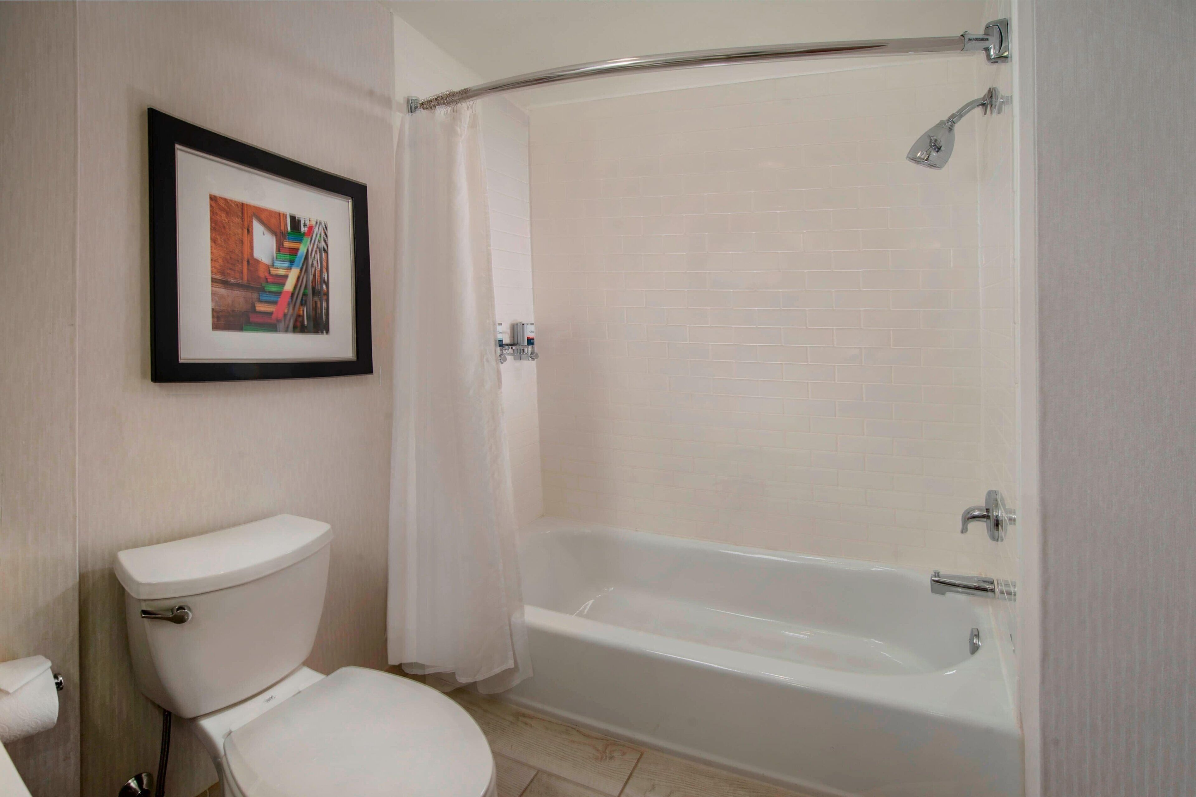 combined shower/bathtub, free toiletries, hair dryer, towels