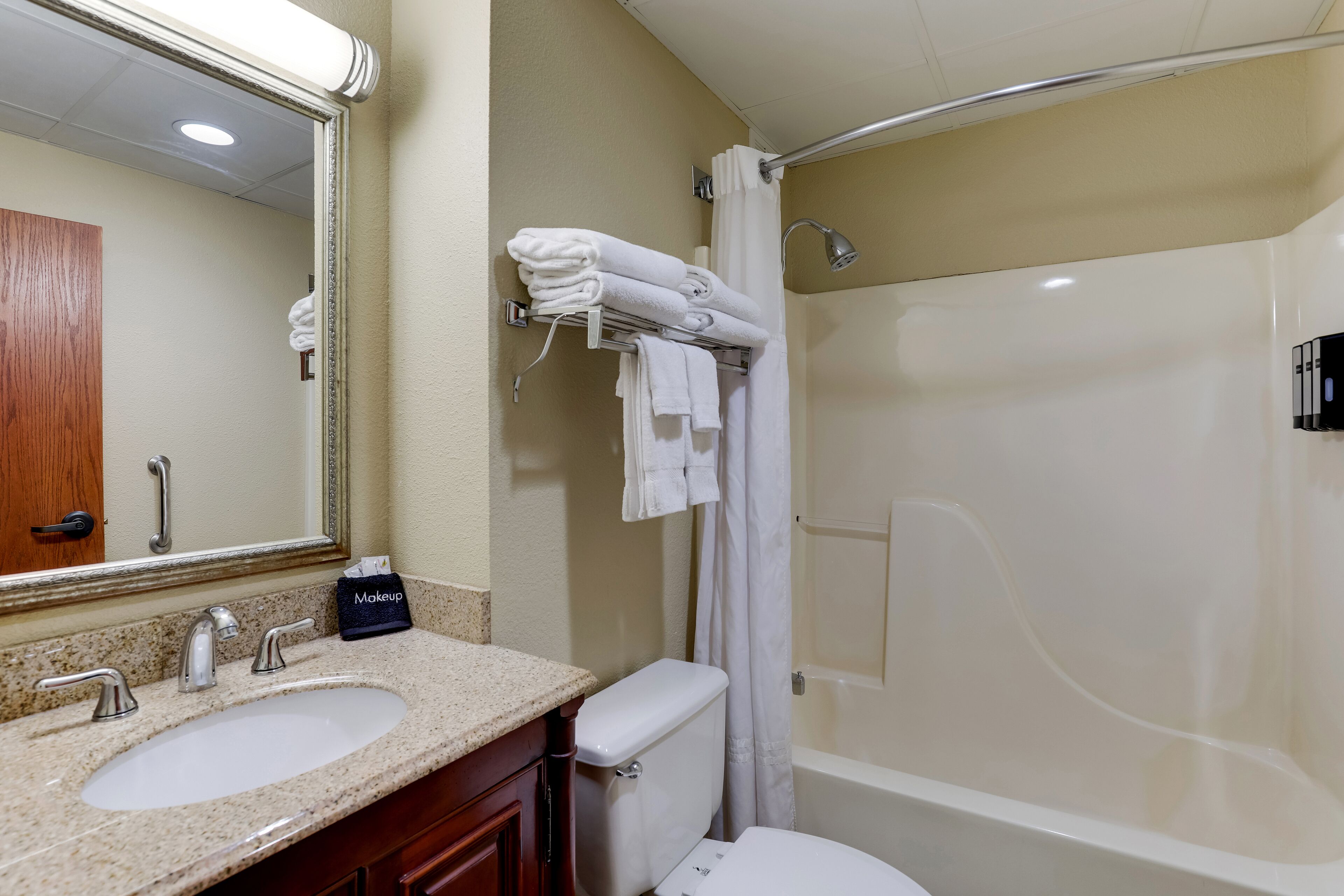 combined shower/bathtub, eco-friendly toiletries, hair dryer, towels