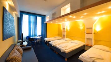 Family Room | Premium bedding, in-room safe, individually decorated