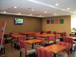 Relax in this stylish room with a dining area, flat-screen TV, and comfortable seating.