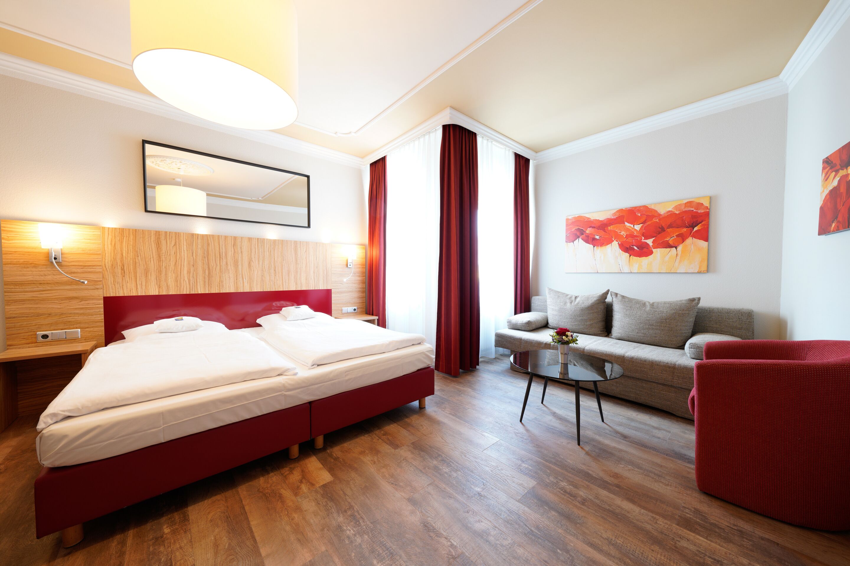 deluxe double room | minibar, in-room safe, individually decorated, individually furnished