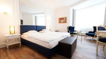 Deluxe Double Room | Minibar, in-room safe, individually decorated, individually furnished