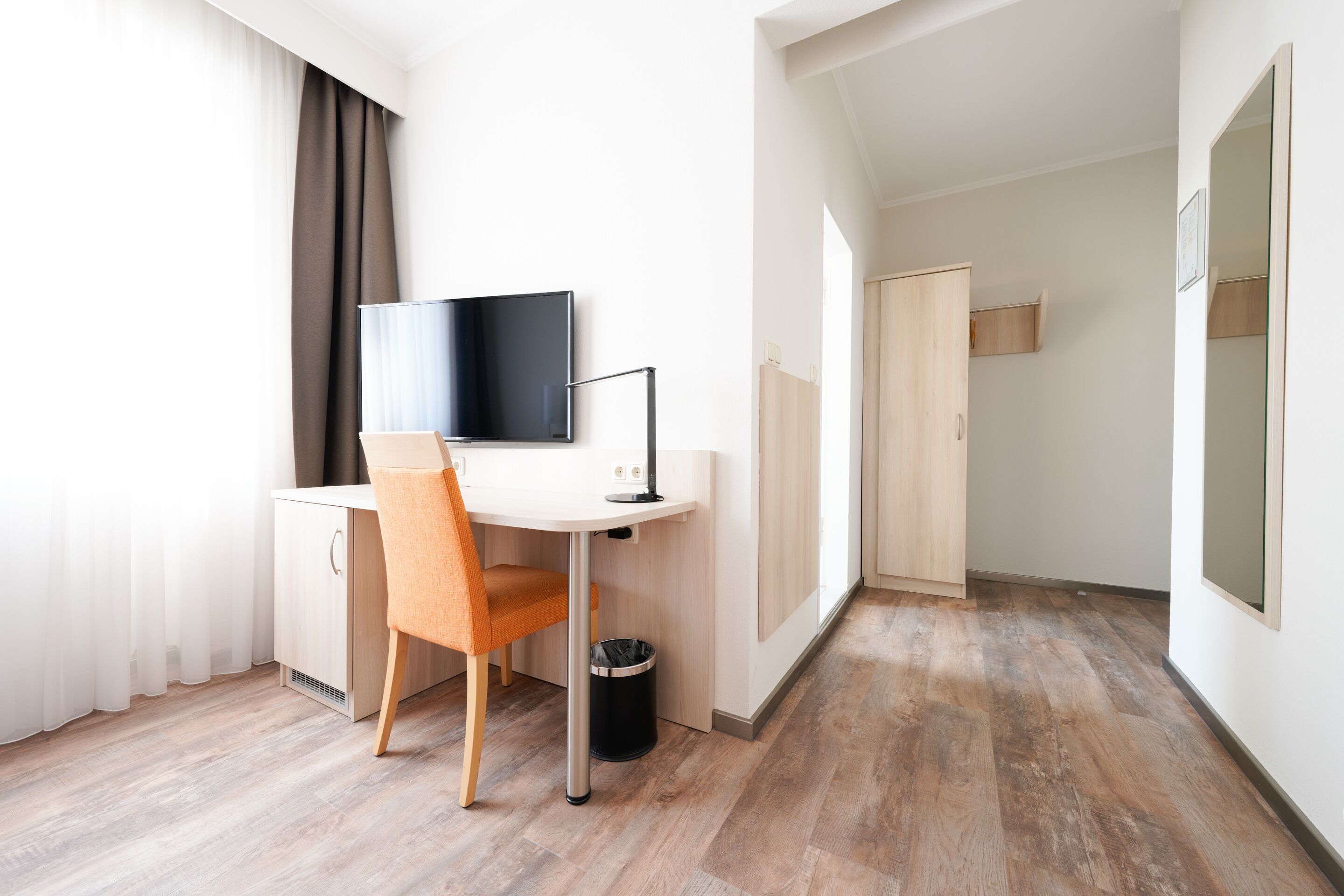 standard single room | living area | tv