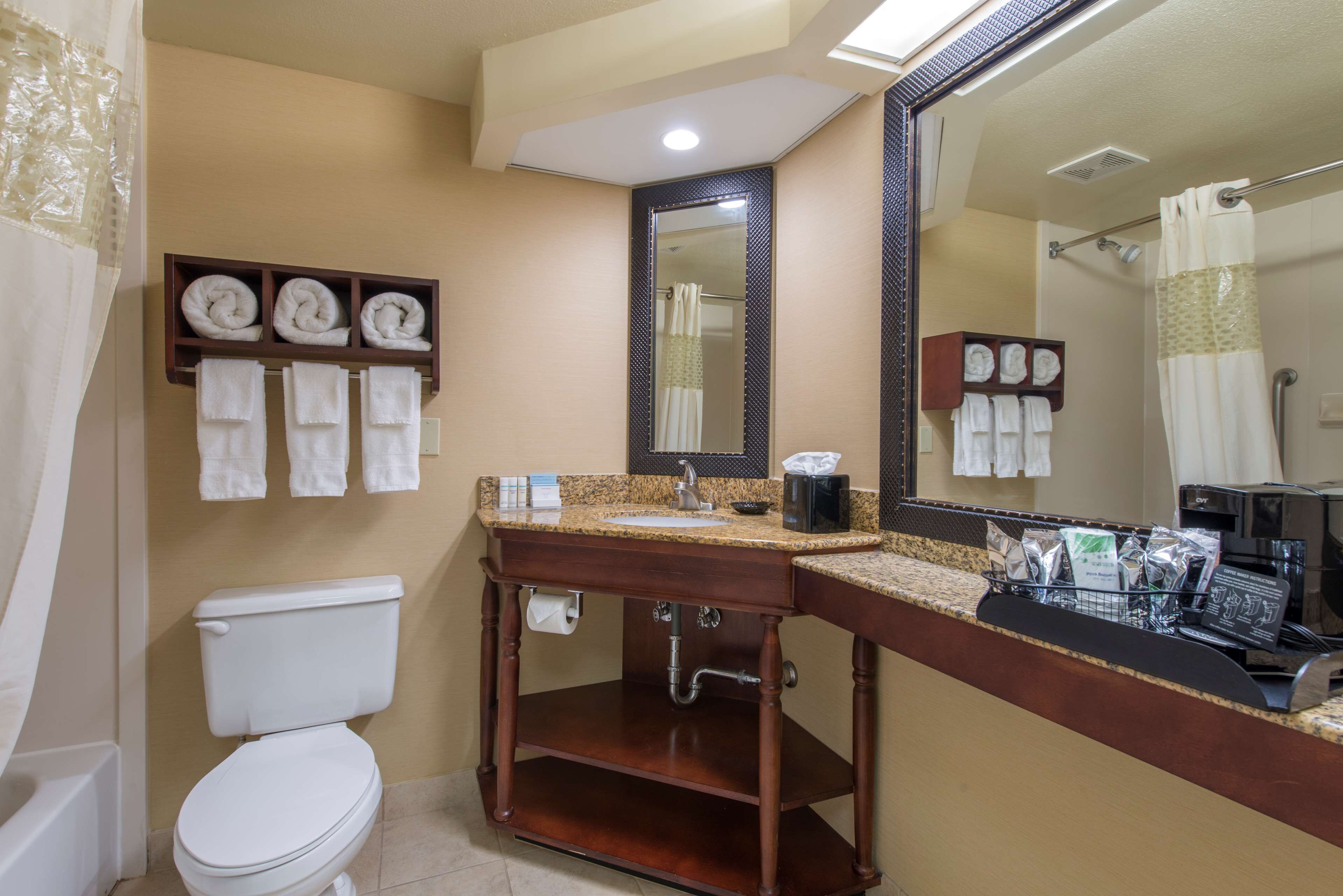 bathtub, free toiletries, hair dryer, towels