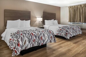 Deluxe Room, 2 Double Beds, Non Smoking | In-room safe, desk, laptop workspace, blackout drapes