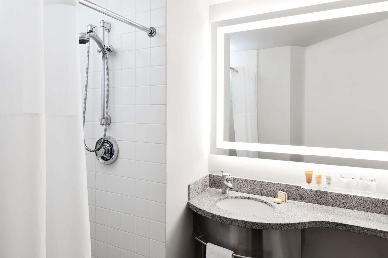 Eco-friendly toiletries, hair dryer, towels