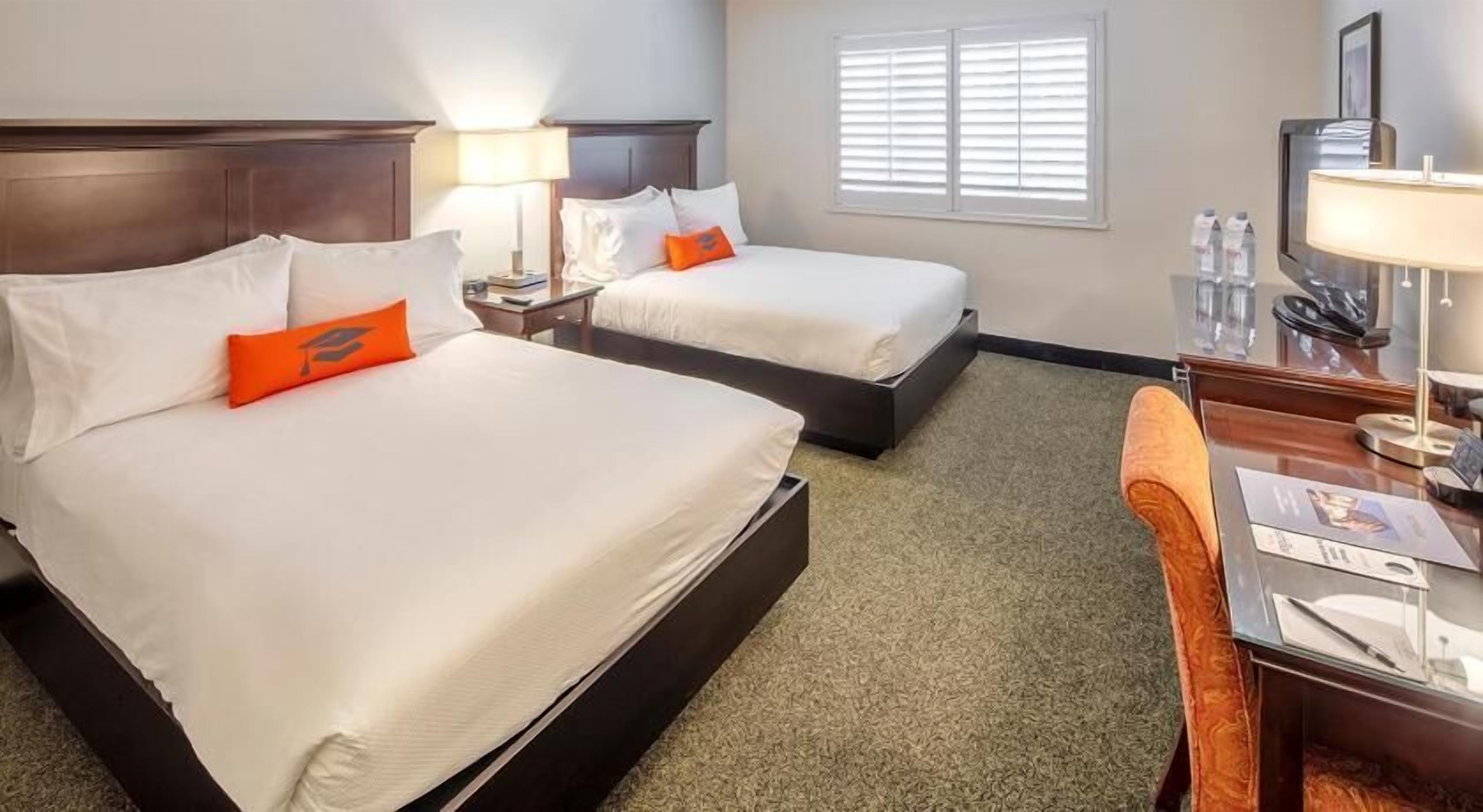 Hypo-allergenic bedding, pillowtop beds, desk, laptop workspace