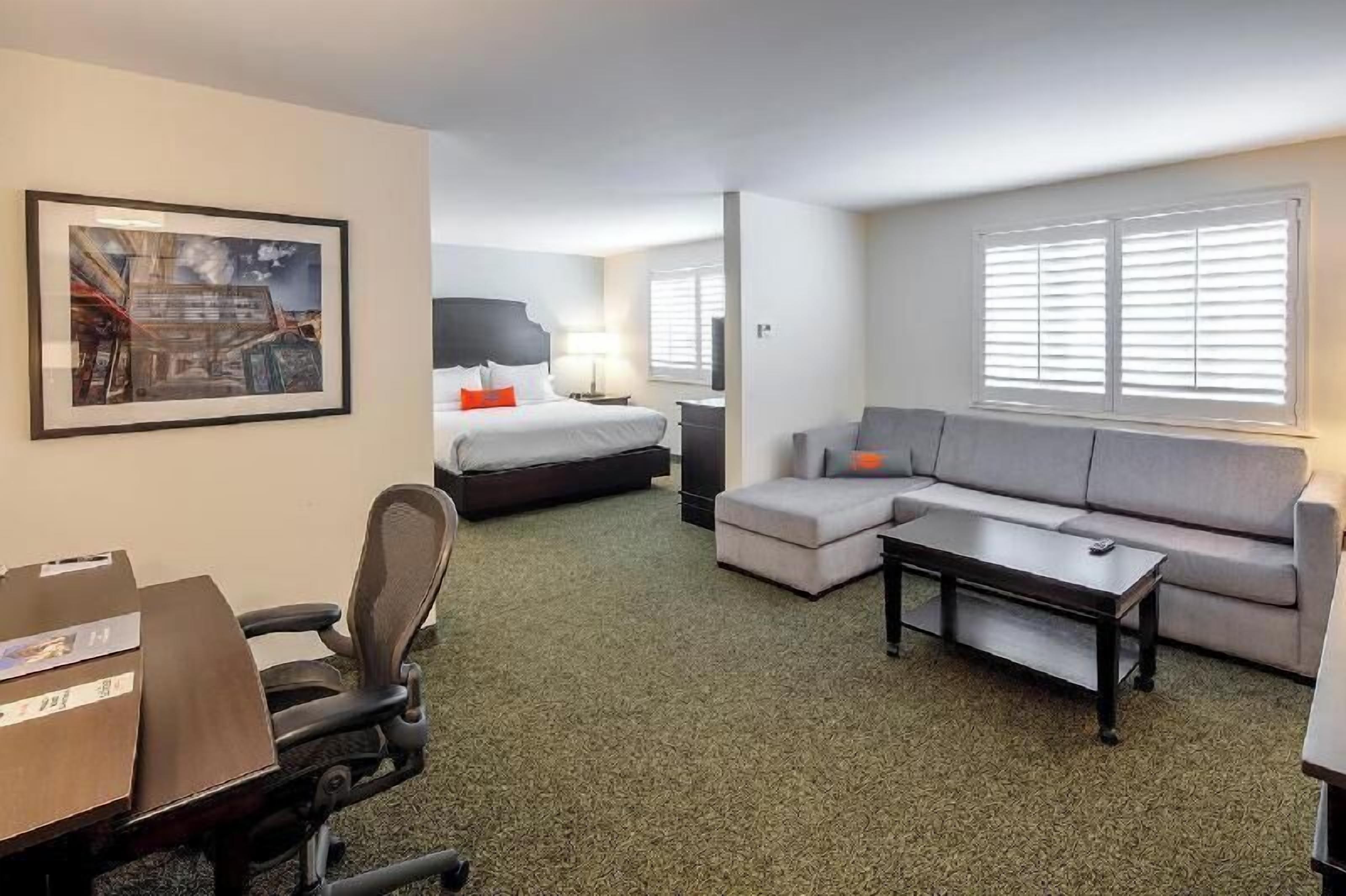 Hypo-allergenic bedding, pillowtop beds, desk, laptop workspace