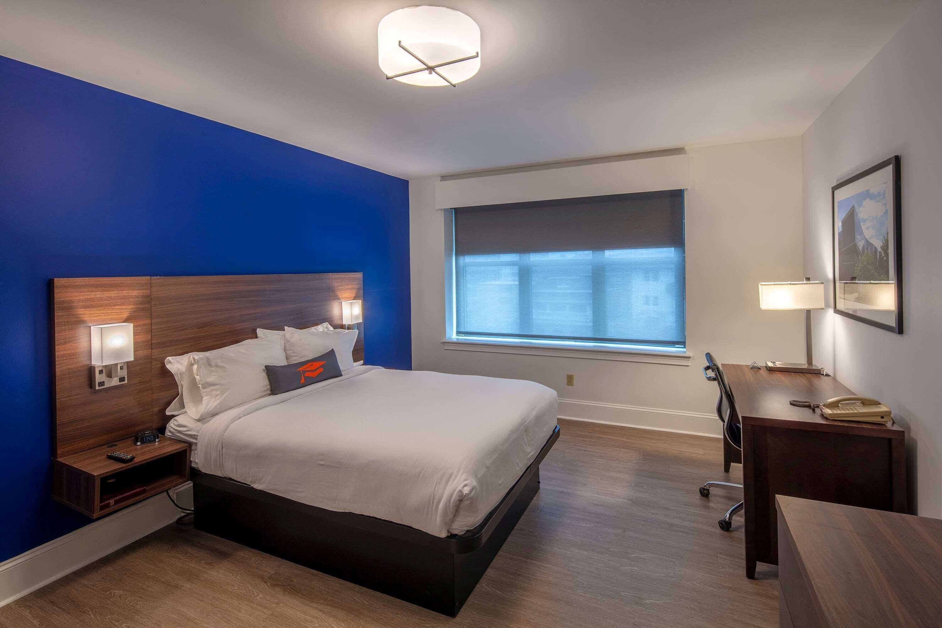Hypo-allergenic bedding, pillowtop beds, desk, laptop workspace