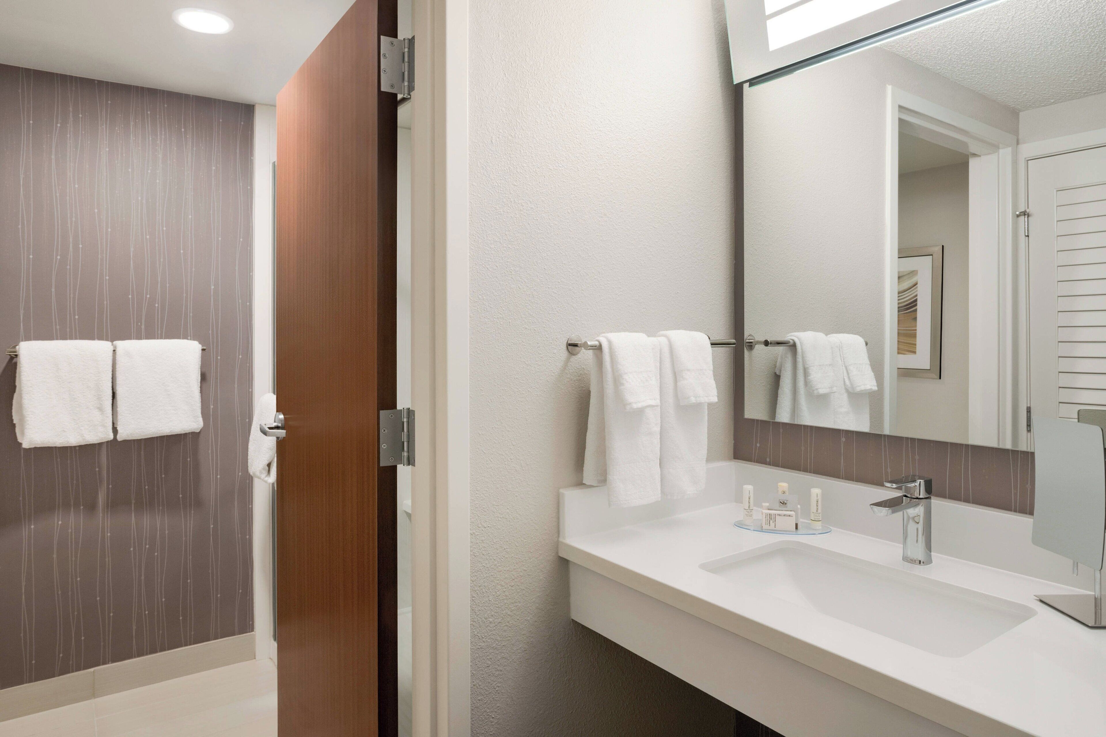 combined shower/bathtub, free toiletries, hair dryer, towels