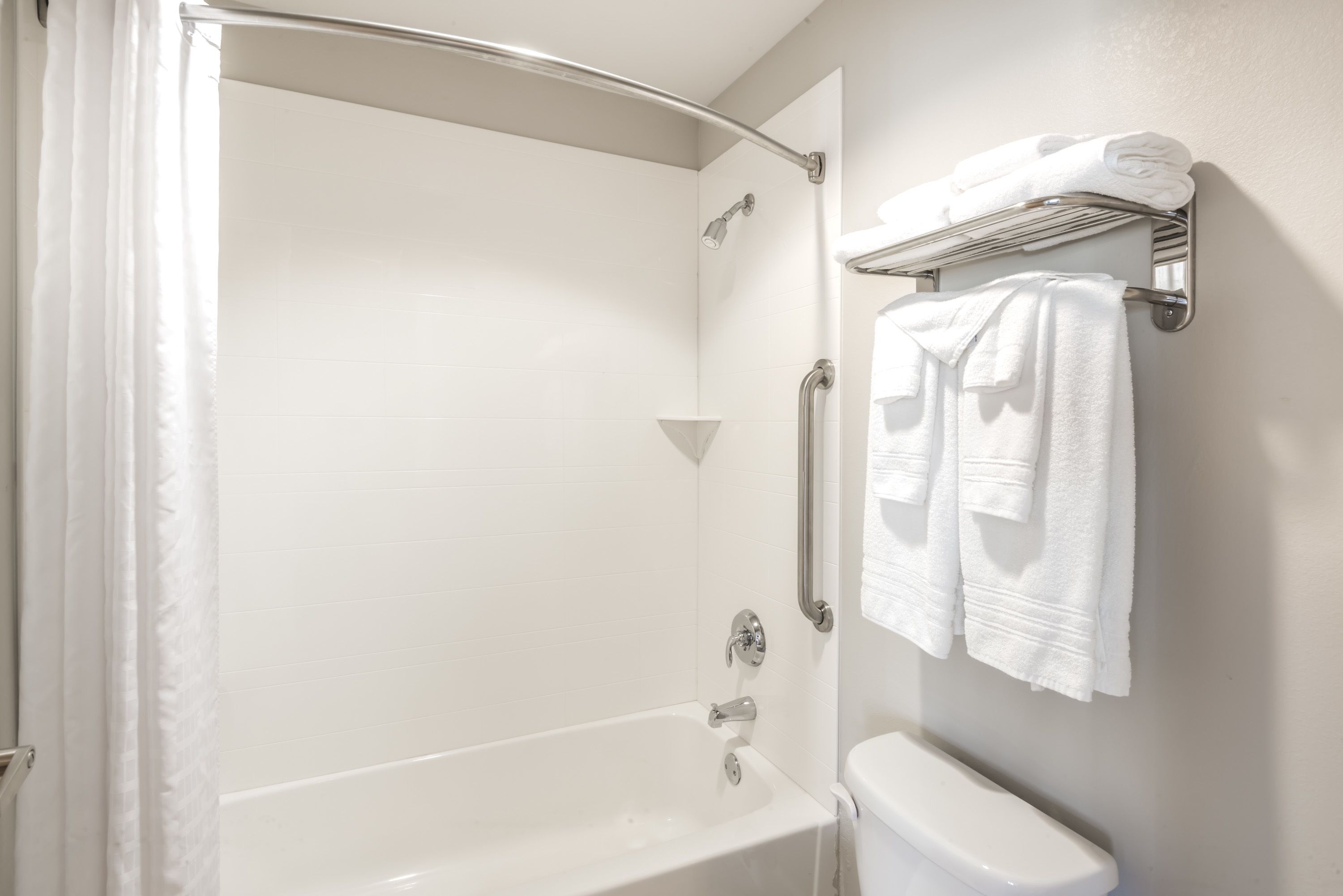 premium bedding, pillow-top beds, desk, laptop workspace