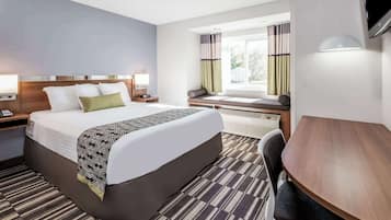 Premium bedding, pillowtop beds, desk, laptop workspace