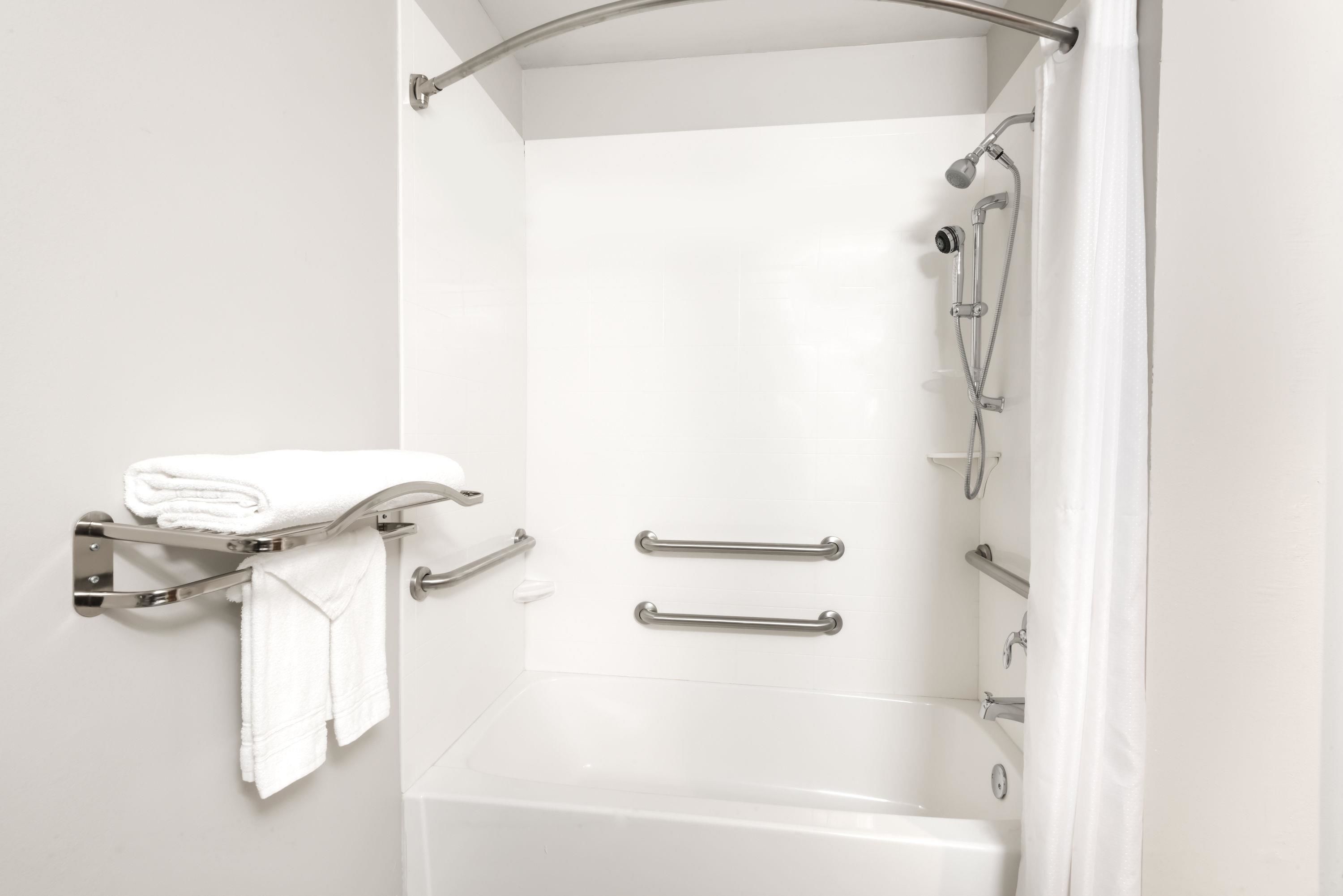 combined shower/bathtub, free toiletries, hair dryer, towels