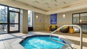 A hotel indoor pool with a 3ft depth, a lifeguard station, and a view of the outside. - Drury Inn & Suites Atlanta Marietta (Marietta)