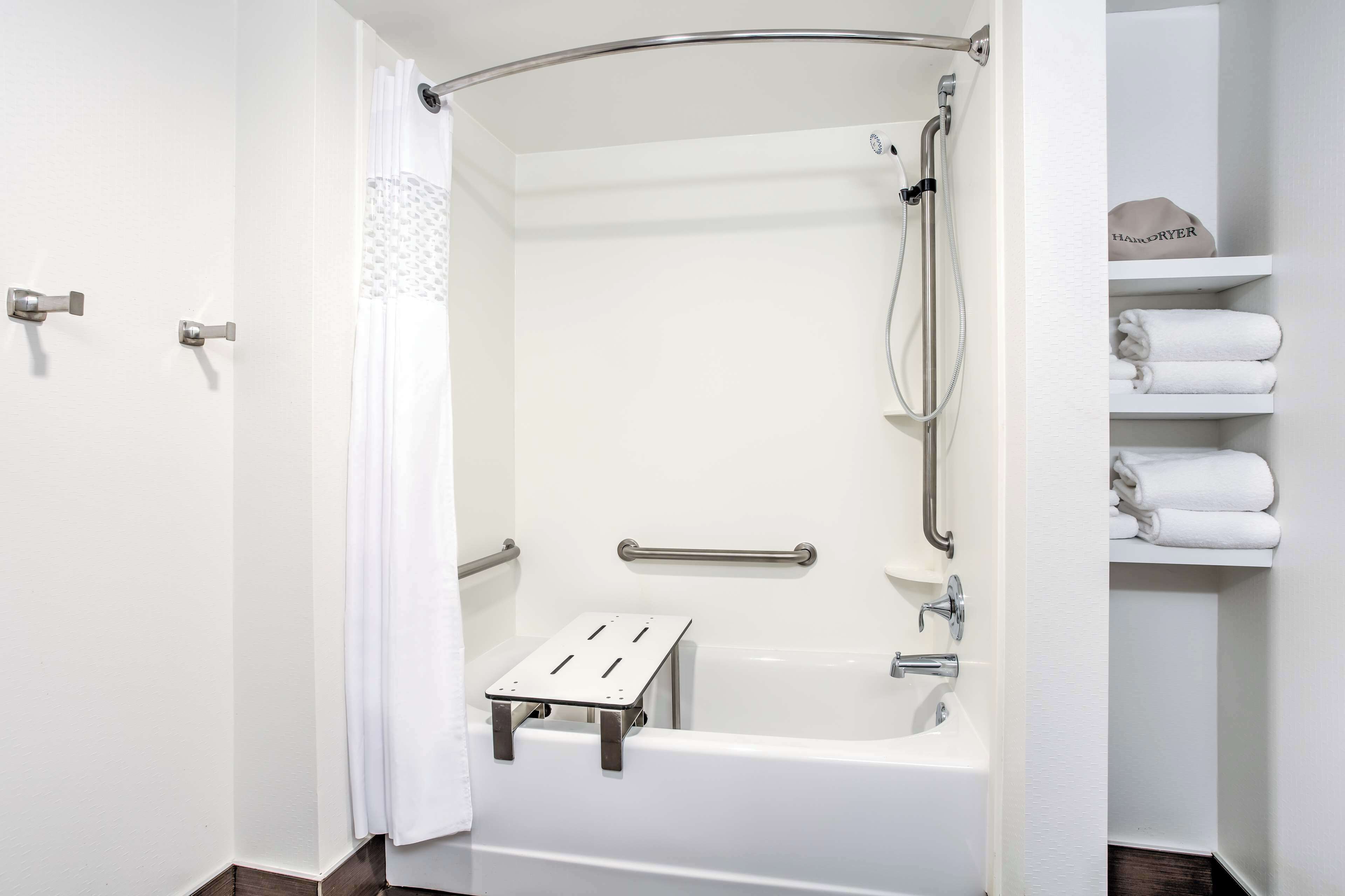 hydromassage showerhead, hair dryer, towels