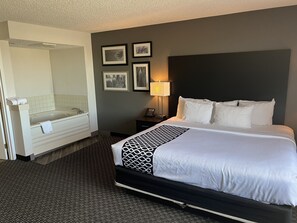 Premium bedding, desk, laptop workspace, blackout curtains