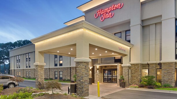 A Hampton Inn hotel with a modern facade, stone accents, and a welcoming entrance. - Hampton Inn Lagrange near Callaway Gardens (LaGrange)